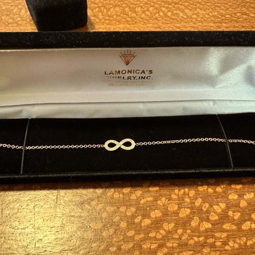 White gold and diamond infinity symbol bracelet.
